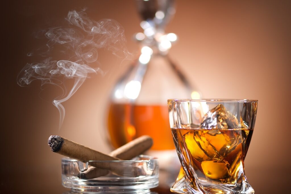 A glass of whiskey and a cigar, the perfect stocking stuffer ideas for men.