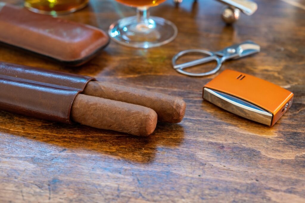 Cigars make excellent gift ideas, especially when accompanied by a high-quality lighter. Picture this scene: a wooden table decorated with cigars and a sleek lighter, creating the perfect ambiance for a thoughtful present
